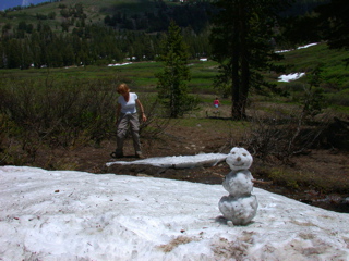 Cathy coming to look at Ken's snowman